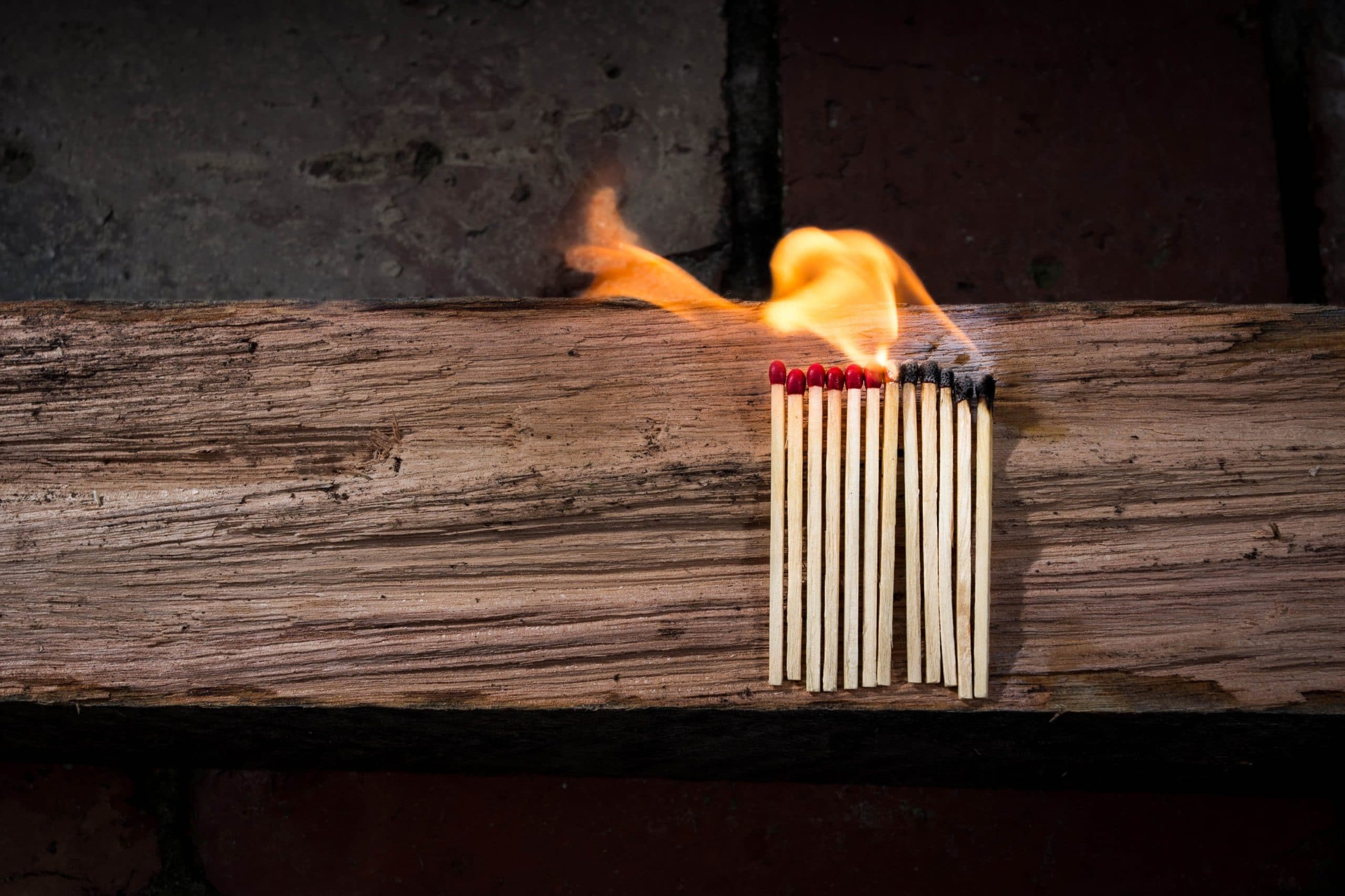 A picture of a line of matches showing a progression of chaos from one to the next; similarly a supply chain attack can have serious consequences for any organization that relies on a third-party provider for IT management services.