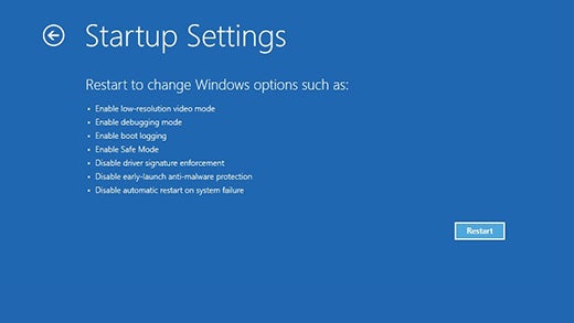 Startup Settings menu with the Restart button on highlight.