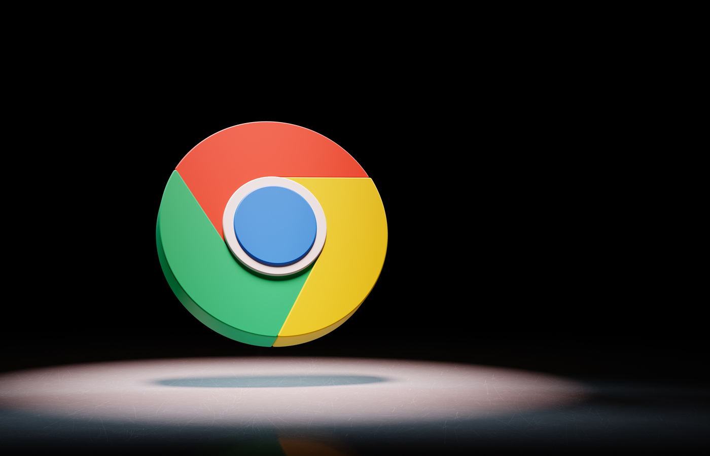 Google Chrome logo spotlighted on black background.