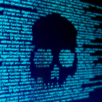 Computer code on a screen with a skull representing a computer virus.