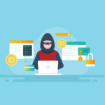 Hooded hacker with laptop trying to do cyberattacks.