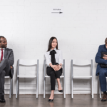 Three People waiting for an interview