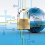 Cybersecurity concept with padlock and globe.